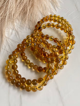 Load image into Gallery viewer, Blue Amber bracelet, amber beaded bracelet group
