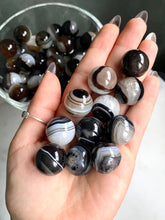 Load image into Gallery viewer, Mini Banded Black Agate & Quartz Spheres